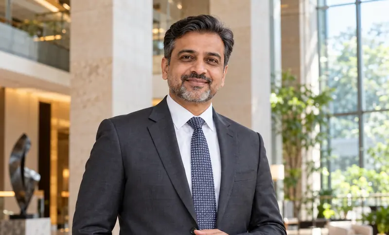 An experienced professional in a business suit